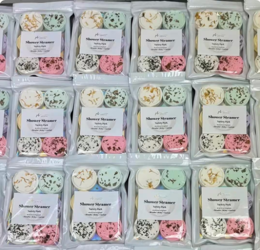 Pampering Bar aromatherapy shower steamers packaged in assorted scents